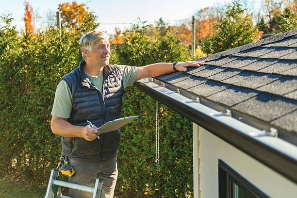 Professional Hail Damage Roof Repair technician working in Wildrose, ND